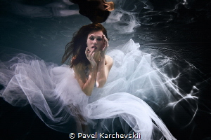 Girl in white dress by Pavel Karchevskii 